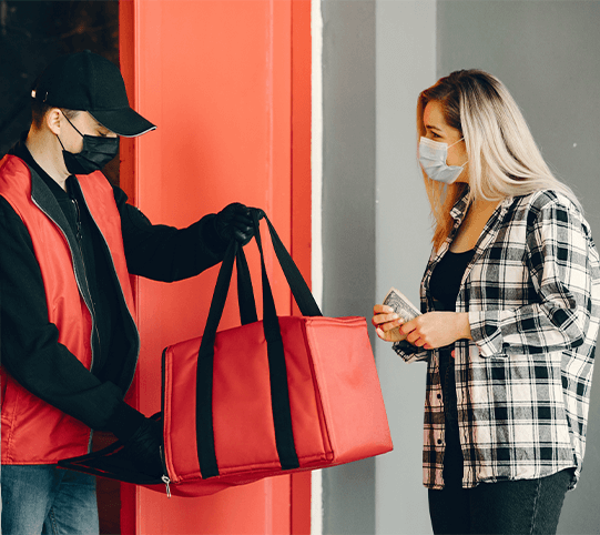 food-delivery-exchange Man delivering takeout to woman