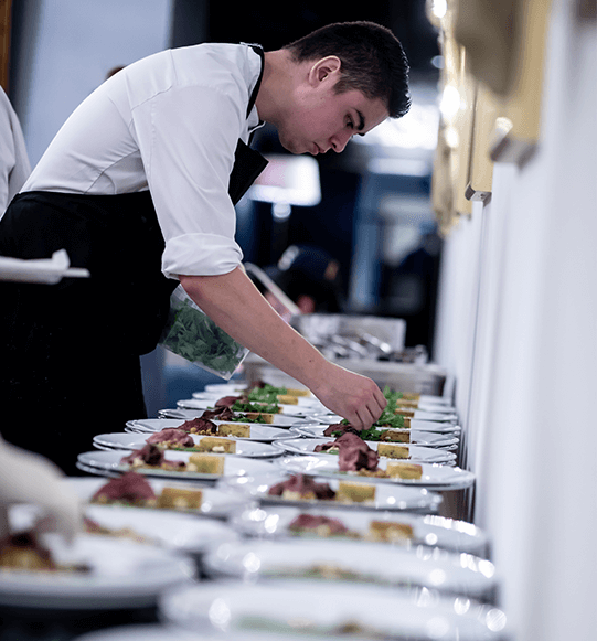 finishing-touches Chef adding finishing touches to a dish